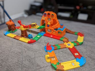 VTech Go! Go! Smart Wheels Treasure Mountain Train Adventure playset.