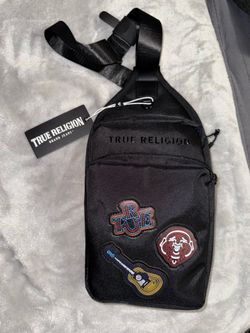 TRUE RELIGION BLACK CROSSBODY BAG WITH GUITAR PATCHES