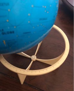 Replogle Celestial map metal six-inch globe.