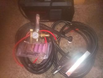 220.     1 20 tig welders arc welder works beautiful like brand new take never been used just to light it up see if it works