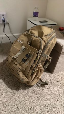 Fishing back back FDE multi pockets  lightly used