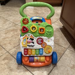 Walker with interactive play