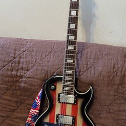 LEO JAYMZ FULL SIZE CLASSIC SINGLE CUT DELUXE-AMERICAN FLAG DESIGN GUITAR. 
