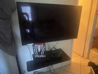 Lg 43” smart tv with wall mount/ floating shelf
