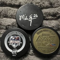 3 Ontario Reign Hockey Pucks