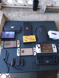 Dock, case, charger. No games are included. $230! Nintendo Switch OLED white 128GB. The White Asus Rog Ally Z1 Extreme $530! 1000GB. The Zelda is $275