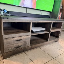 *Trinell 63" TV Stand*      *ASHLEY FURNITURE*