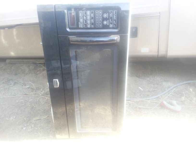 Maytag Over The Stove Microwave With Range Light And Exhaust Fan