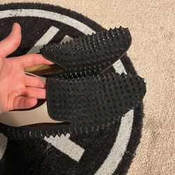 Christian Louboutin — Red Bottoms