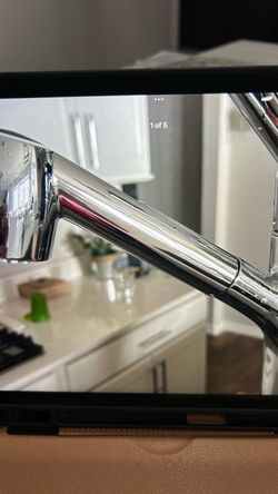 Moen brand chrome pull down spray faucet. New just changed out the style.