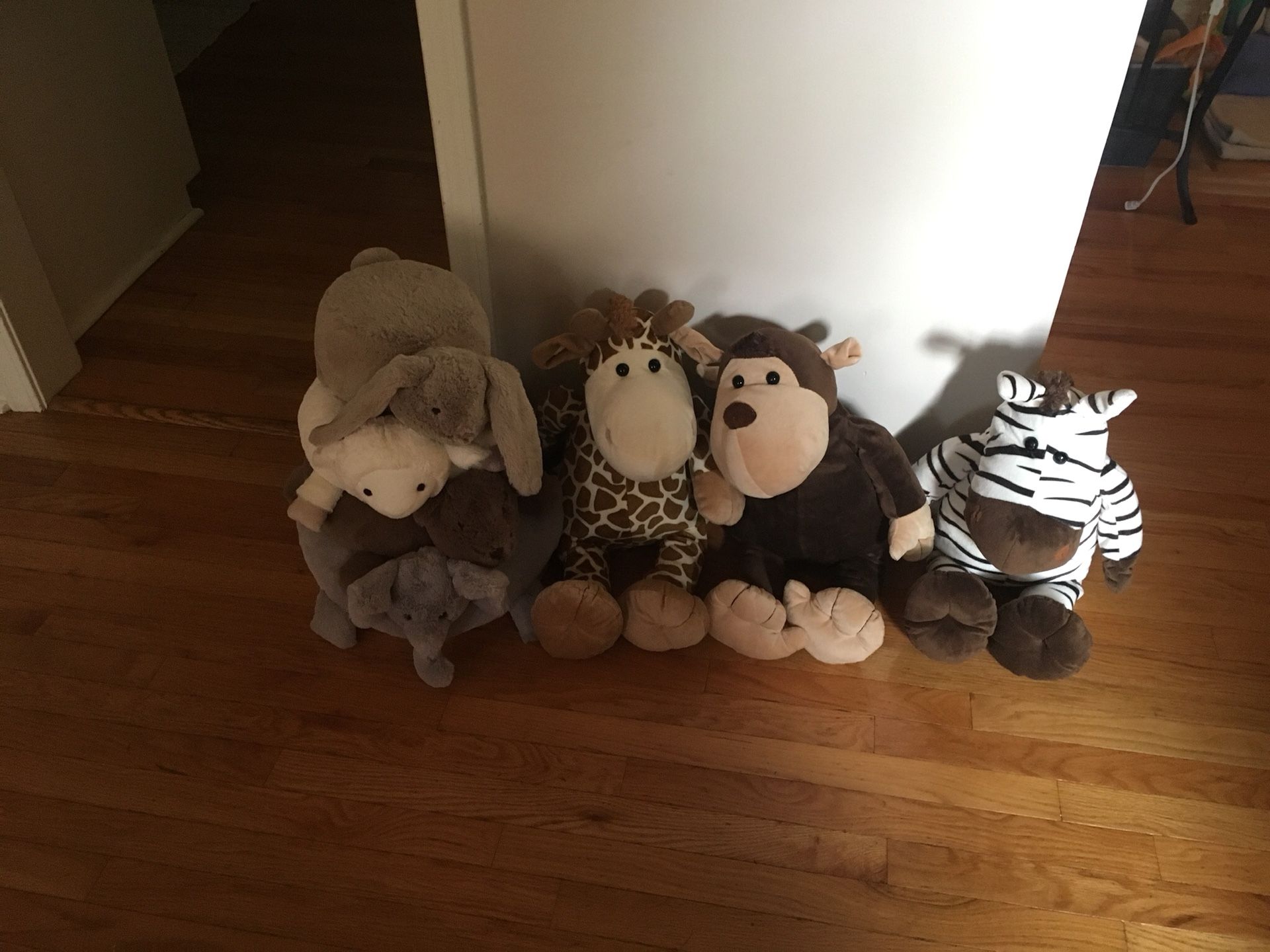 Pottery barn stacking toy and 3 large stuffed animals