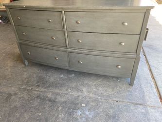 Grey curved dresser