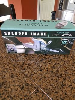 NEW Car vacuum by Sharper Image