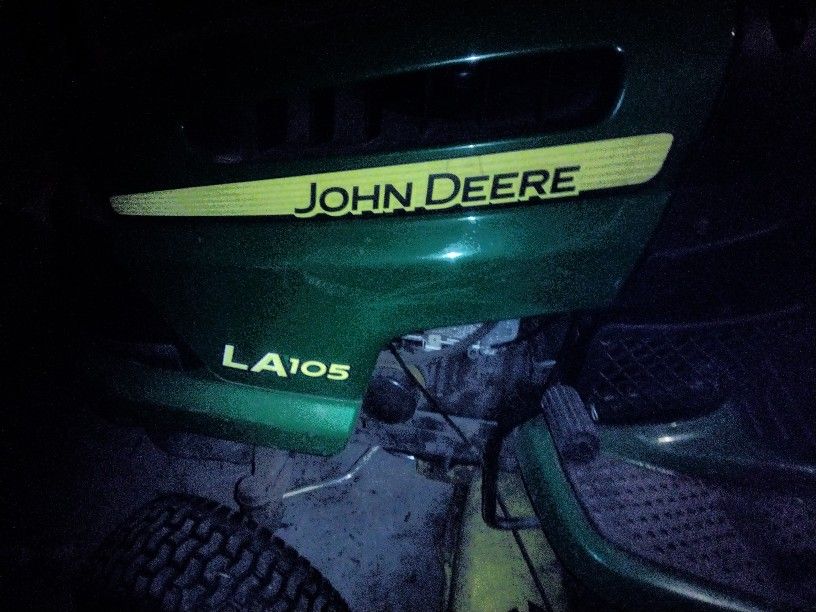 John Deere Riding Mower, Husqvarna Backpack Blower, Echo Chain Saw, Echo Weed Eater.
