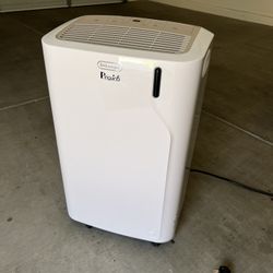 Portable AC unit barely use sat in the garage under plastic cover