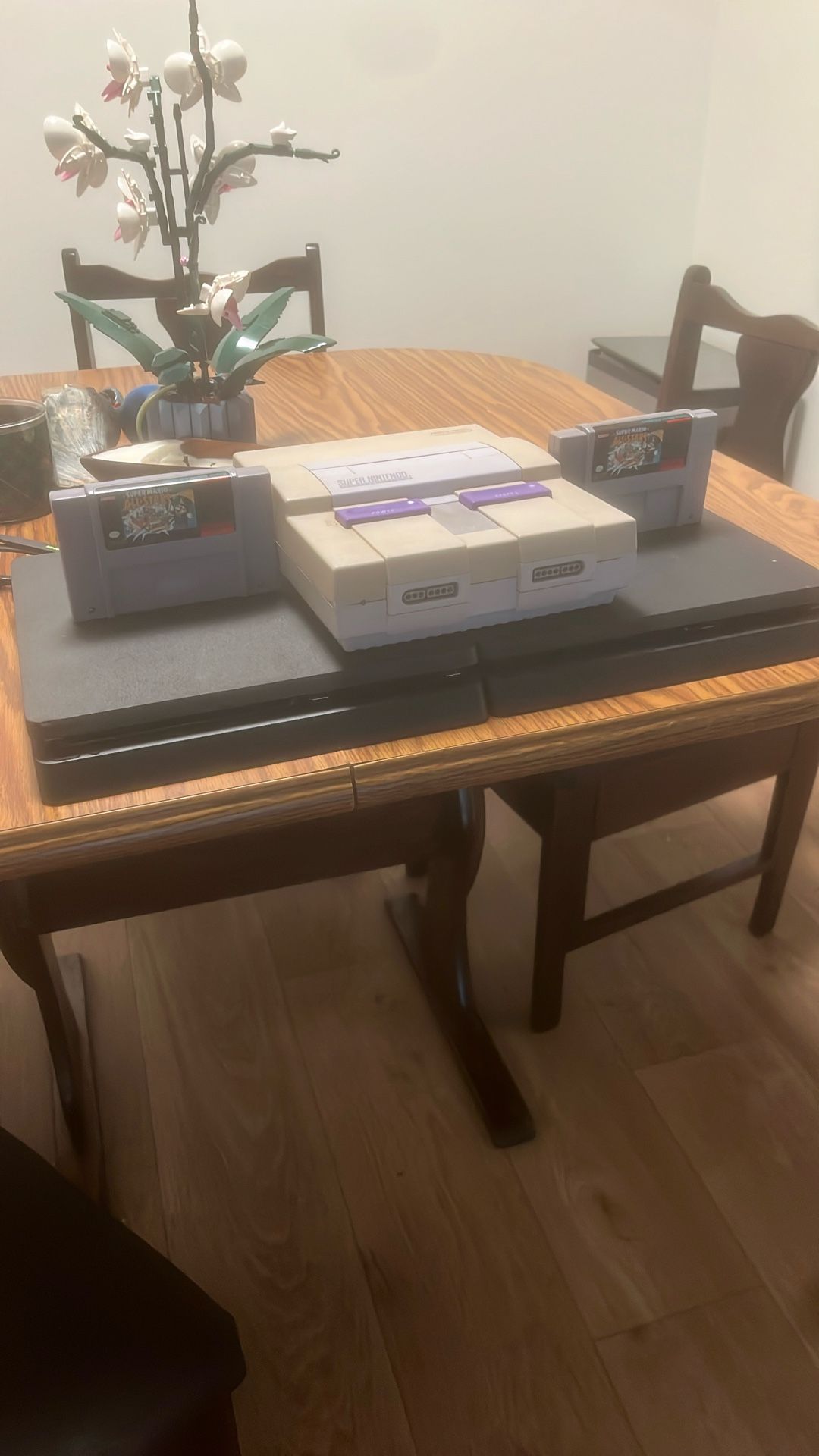 One Super Nintendo! Two PS4’s, Two Copies Of Super Mario All Stars! Zero Controllers And One PS4 Power Cable
