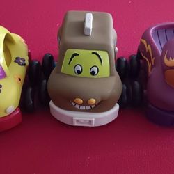 THREE PULL BACK TOY CARS