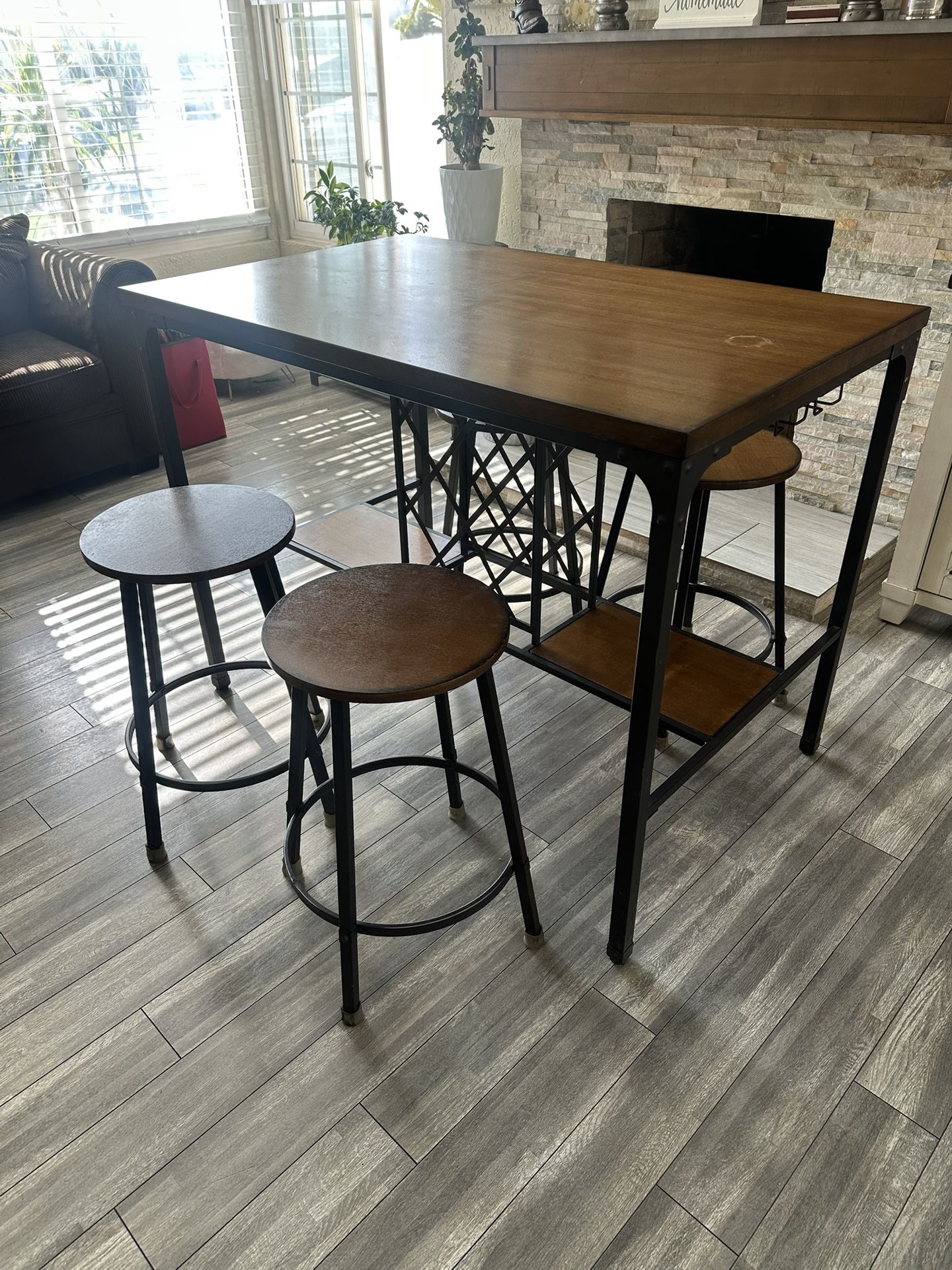 Brown and Black Pub Table with Built-In Wine Cage