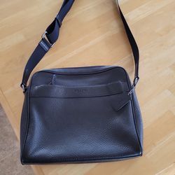 Black coach purse with adjustable strap