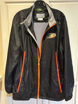 official Reebok NHL Anaheim Ducks Center Ice Collection Kinetic Fit Windbreaker Jacket in black with orange zipper size L