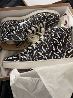 Christian Louboutin (red Bottoms)