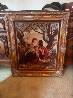 Vintage frame with decorative handmade cross stitch