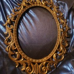 Vintage  brass regency  style  oval frame 