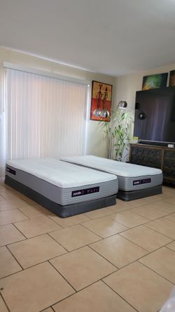 2 VERY NICE XL TWIN PURPLE MATTRESSES AND BOXSPRINGS FOR SALE ! IN EXCELLENT CONDITION, FREE DELIVERY