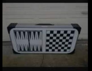 Coleman portable kitchen aluminum folding table with sink, Camping checkers,backgammon game table.This is a used table, still great condition, needs