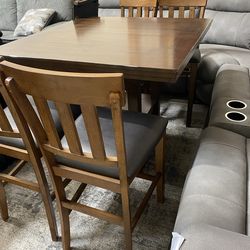 Counter height 6pc dining set solid wood medium brown 42-60”table (leaf included) and 4 matching chairs $599 (was $799, msrp $1,299) pick up or delive
