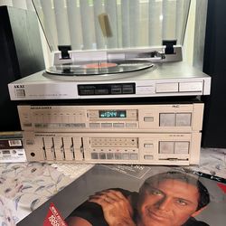 AKAI turntable, MARANTZ stereo Tuner and Amp power, And KEENWOOD speakers