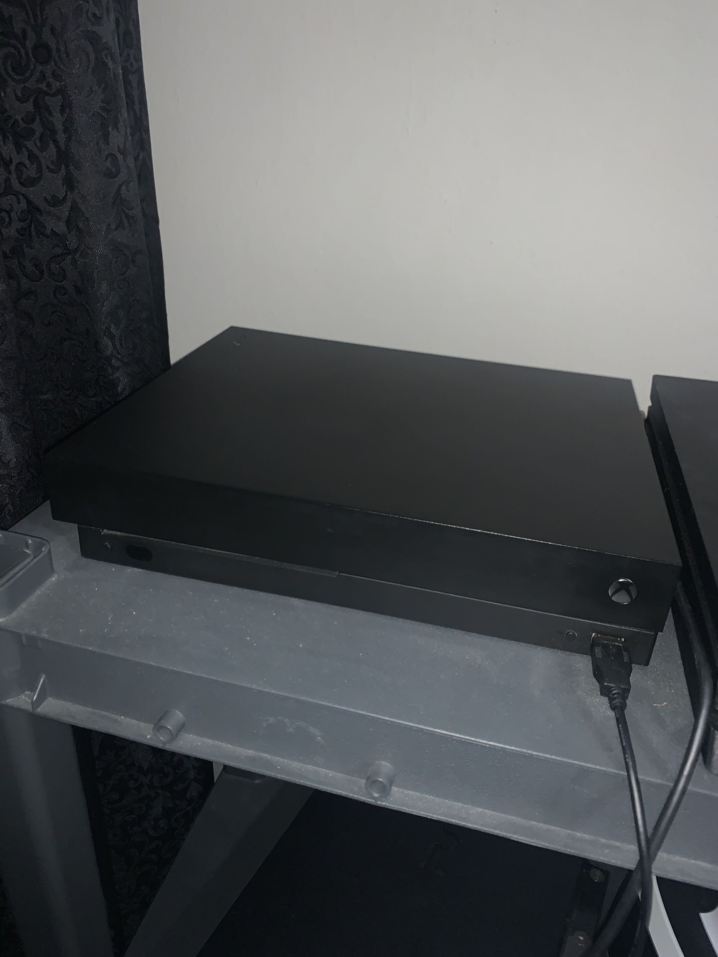 Xbox one X 1Tb in perfect condition includes all cables and a special edition blue controller. Also with Black ops 4. Will do trades!