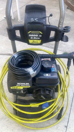 Pressure Washer And Good Conditions Gone And Two Houses One Of The Houses Has A Little Hole