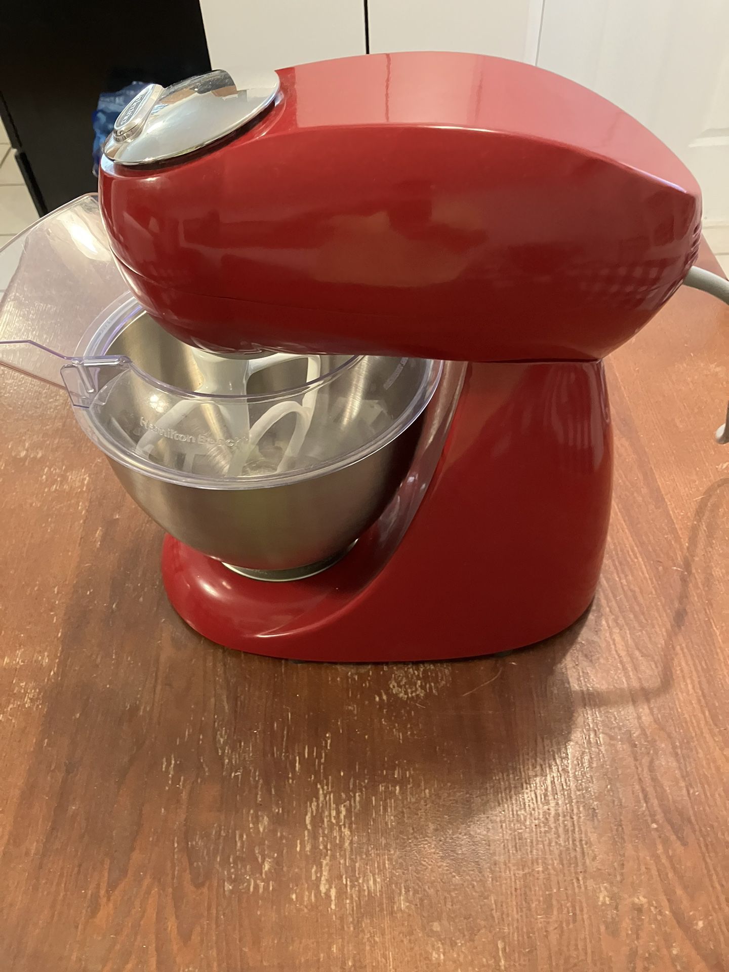 RED Hamilton Beach stand mixer with bowl, dough hook, paddle and guide to add ingredients without making a mess.