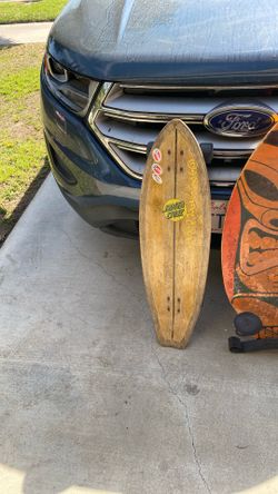 Green and black Santa Cruz skateboard cruiser