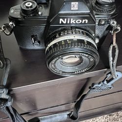 Nikon EM Camera With Flash Attachment 
