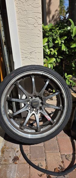 4 Rims with  bearly used tires