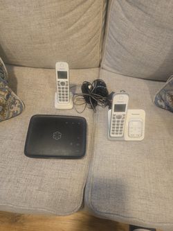 Ooma Home Phone Box And Panasonic Home Phone