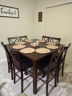 Dining table with 8 chairs (counter height)