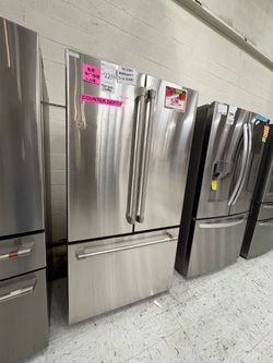 Cafe 23.1 cu ft smart French door refrigerator in counter depth with internal water dispenser