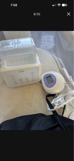 Breast feeding milk extractor and warmer