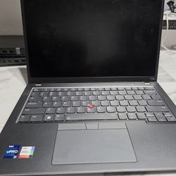 New Lenovo ThinkPad T14s laptop. Intel vPRO inside with Iris Xe Graphics. Keyboard is backlit, also has that cool red TrackPoint.