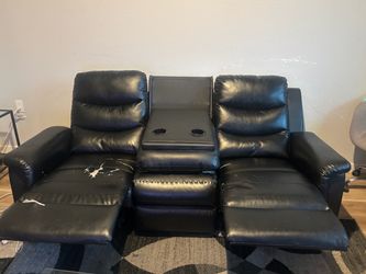 Black faux leather couch