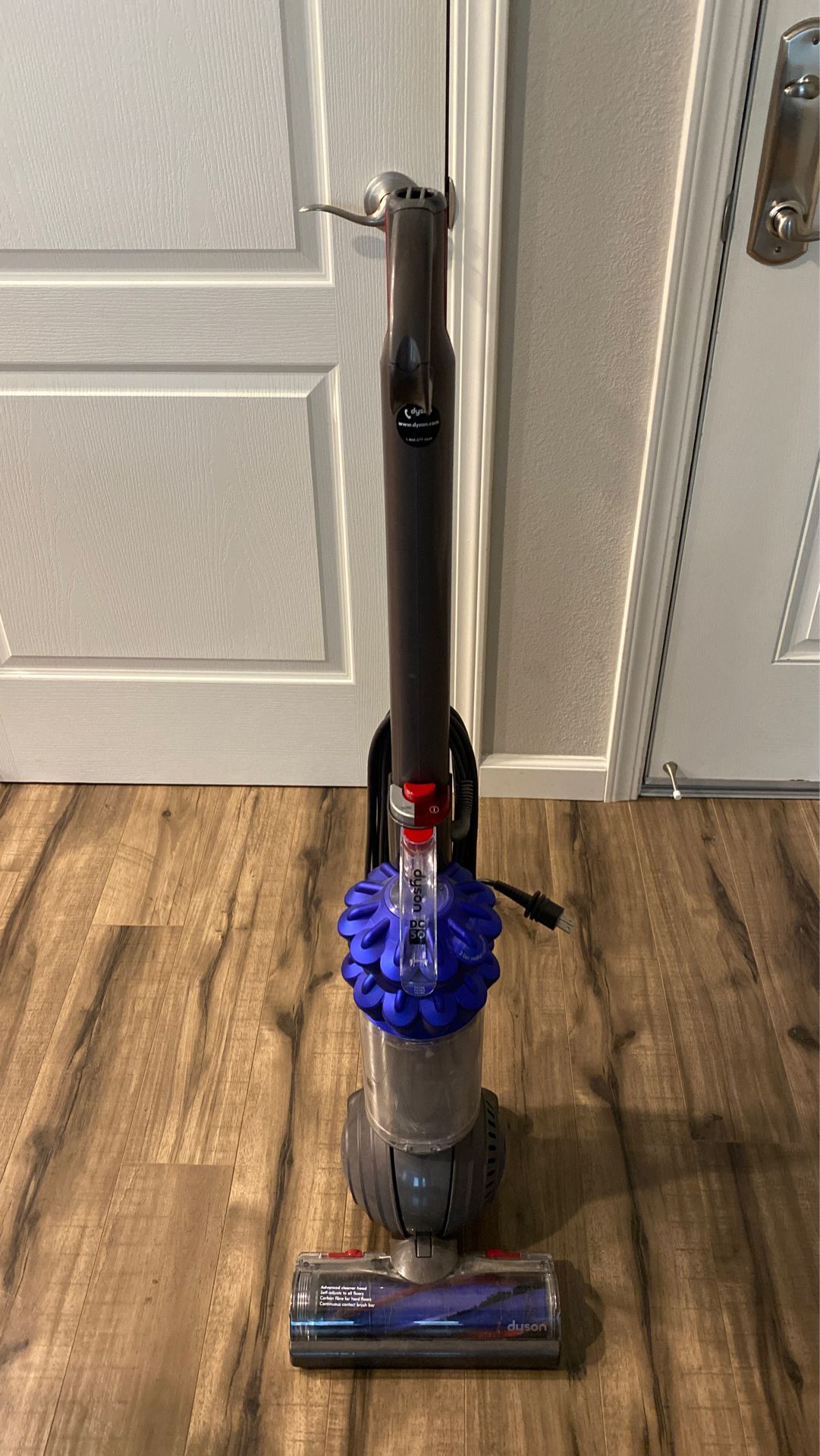 Dyson DC50 vacuum with 4 attachments and wall mount