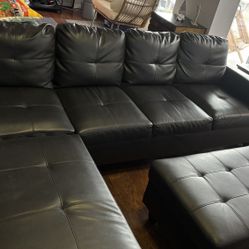 Wilhelmine 103.5” Black Wide Faux Leather Sofa & Chaise