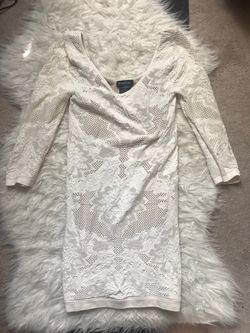 Bebe bodycon mini dress in cream size M/L $25 obo