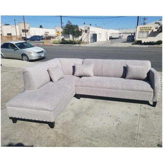 BRAND NEW 7X9FT AND 9X7FT SECTIONAL CHAISE, ANAPOLIS LIGHT GREY FABRIC. CUSTOM MADE AVAILABLE