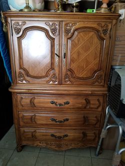 5ft tall x 3' 4" wide antique solid wood armoire