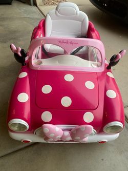 This is a Huffy Disney Minnie Mouse 6-volt electric car