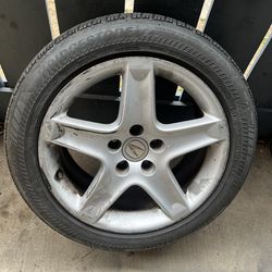 Acura Tl rim with tire